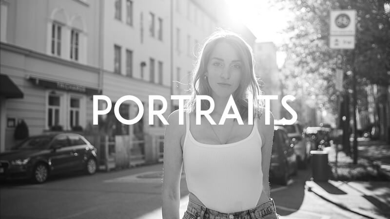 a woman standing on a street