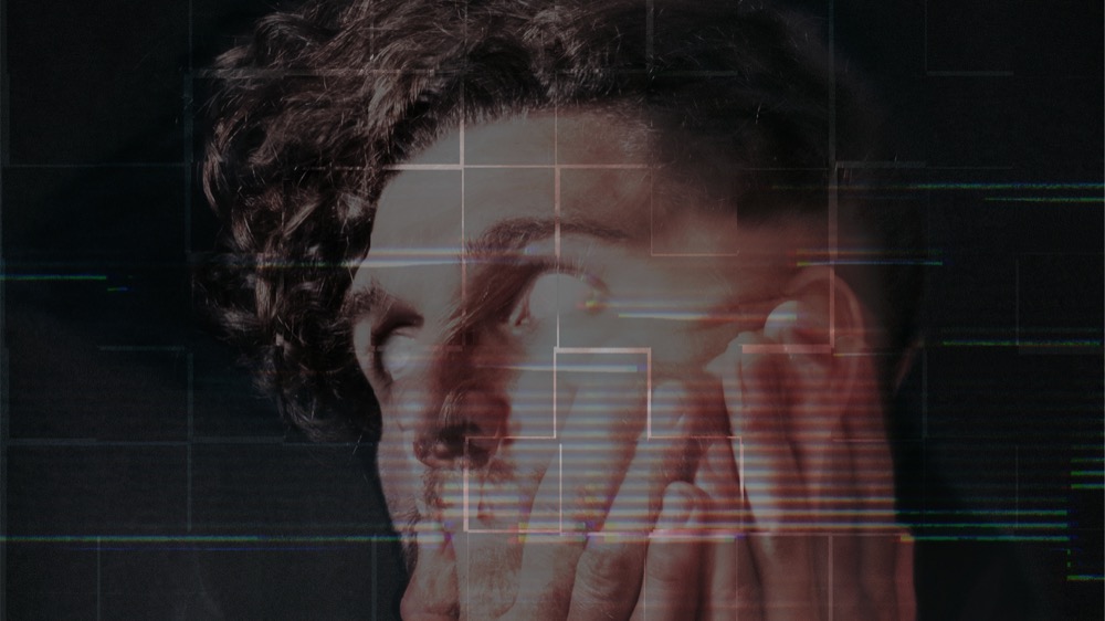 Mama Killa Records a man with his hands on his face. his puppils aren´t visible